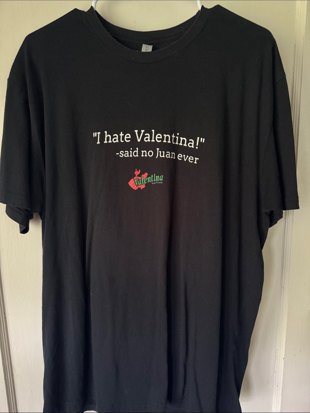 Valentina Black Tee with White Slogan and Red-Green Logo